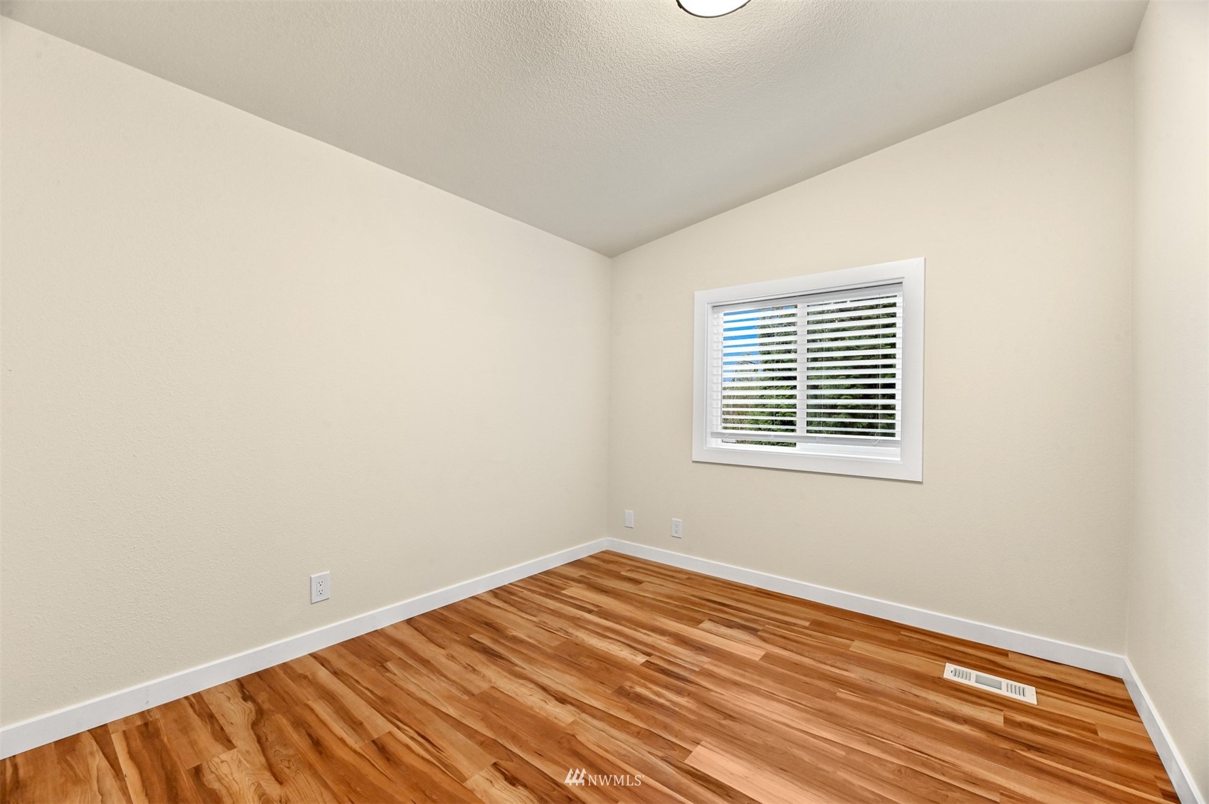 4423 Masterson Road Birch Bay, WA 98230 - Photo 15 of 20 a view of a room with wooden floor and a window