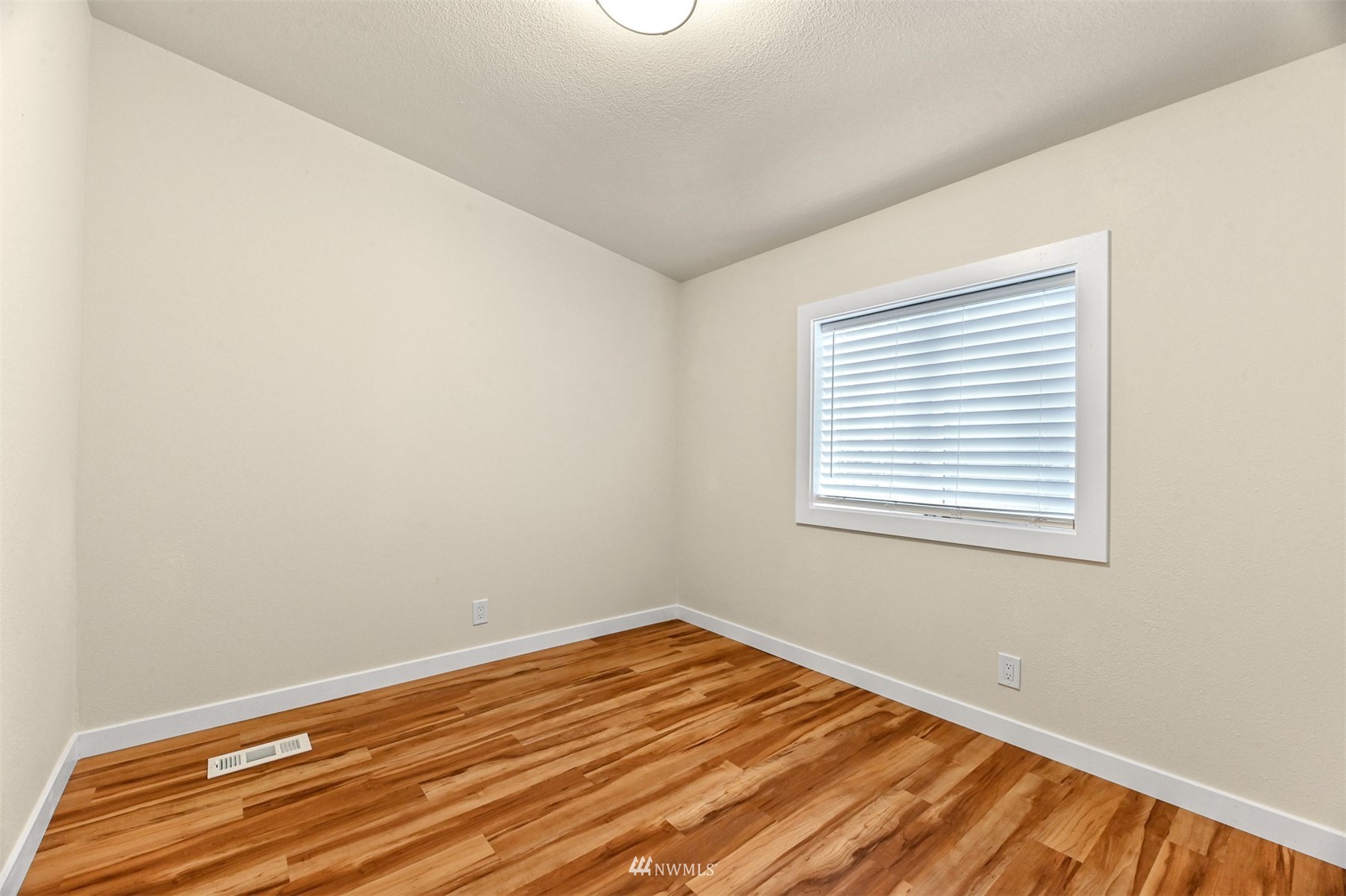 4423 Masterson Road Birch Bay, WA 98230 - Photo 16 of 20 a view of a room with wooden floor and a window