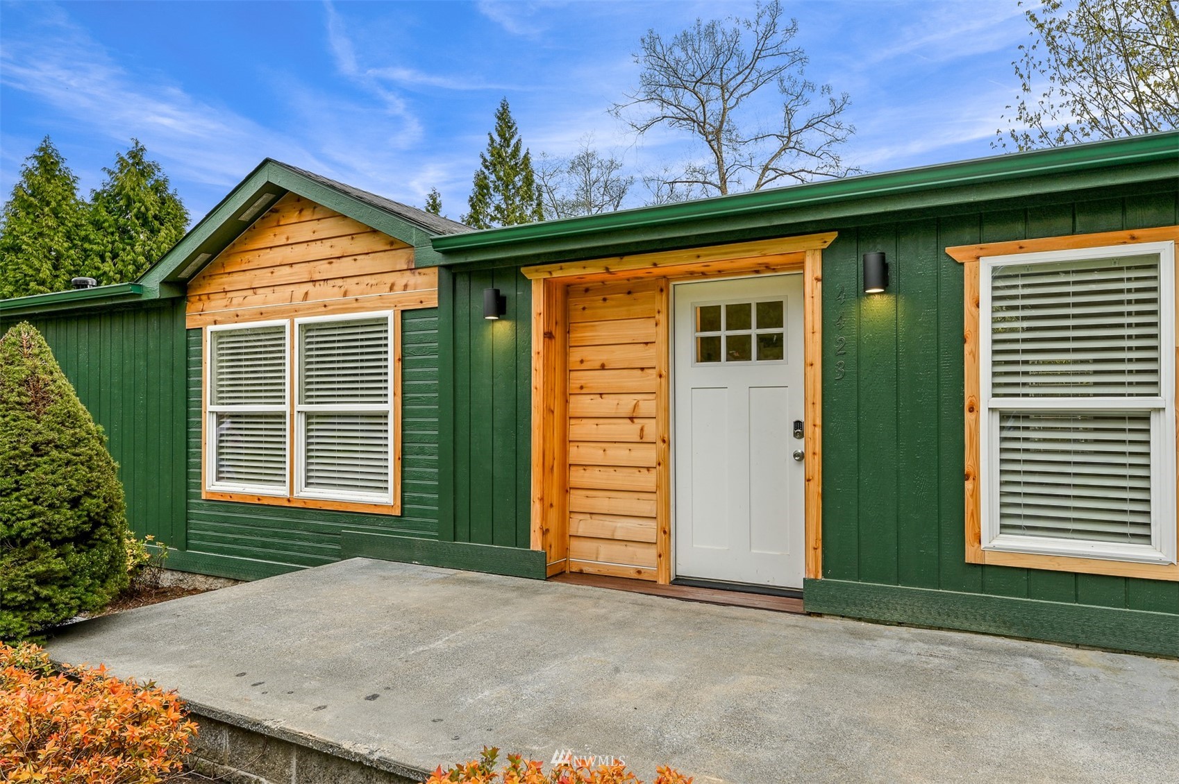 4423 Masterson Road Birch Bay, WA 98230 - Photo 2 of 20 a front view of a house with a yard and garage