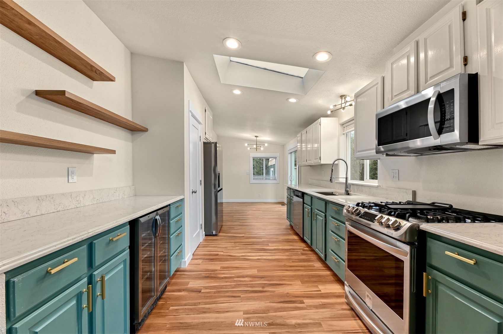 4423 Masterson Road Birch Bay, WA 98230 - Photo 9 of 20 a large kitchen with stainless steel appliances