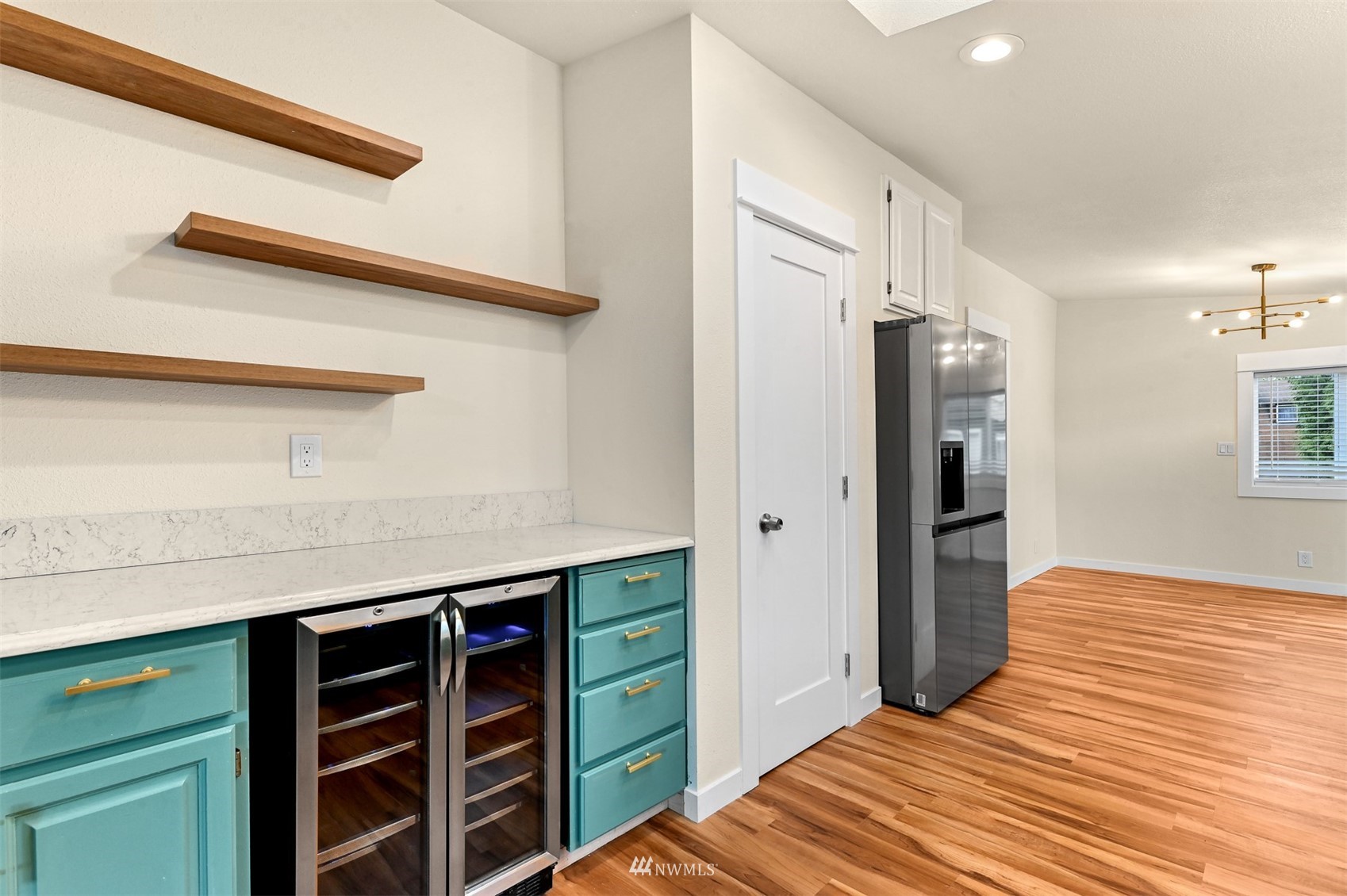 4423 Masterson Road Birch Bay, WA 98230 - Photo 10 of 20 a kitchen with a refrigerator and a cabinets