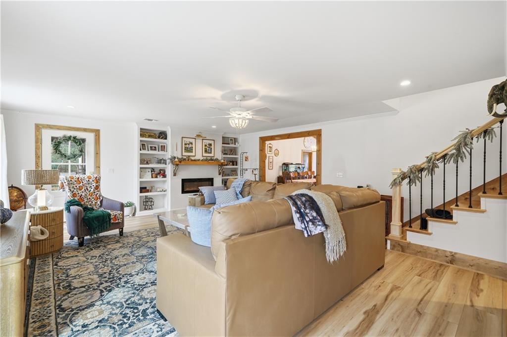 34 Bodie Road Talking Rock, GA 30175 - Photo 18 of 49 a living room with furniture and a wooden floor