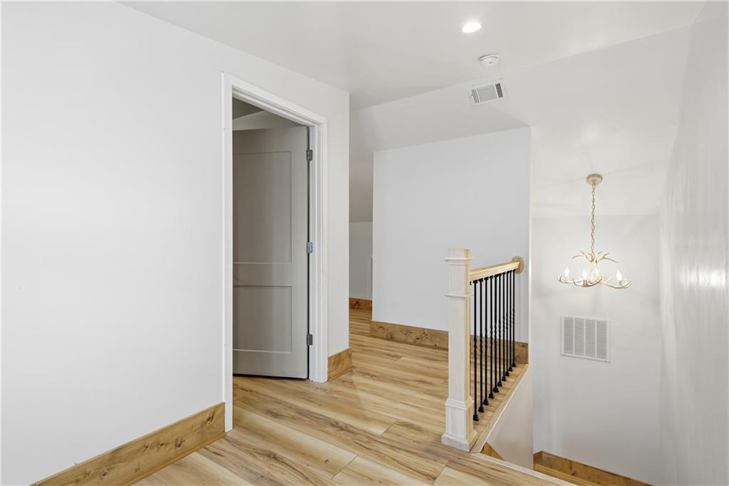 34 Bodie Road Talking Rock, GA 30175 - Photo 35 of 49 a view of a hallway with wooden floor