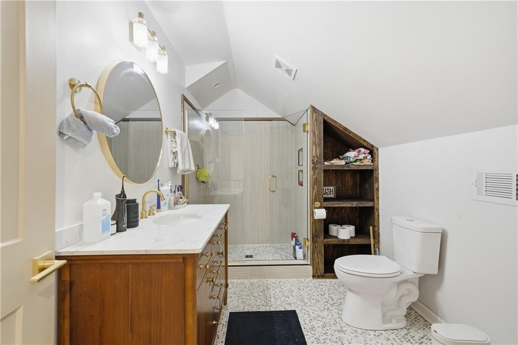 34 Bodie Road Talking Rock, GA 30175 - Photo 36 of 49 a bathroom with a sink toilet and shower