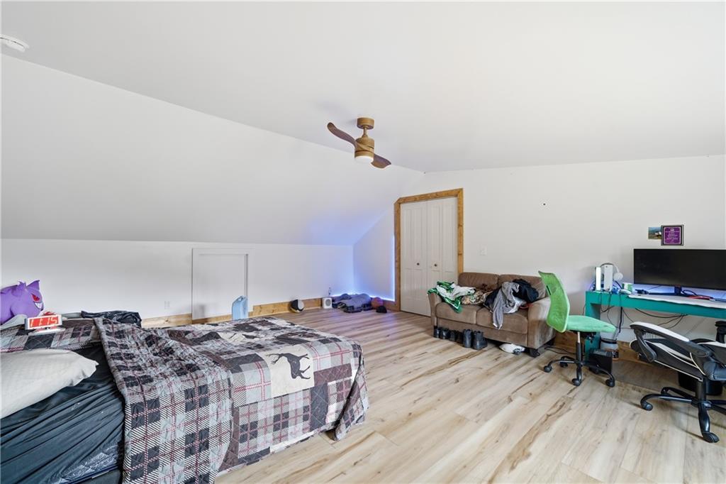 34 Bodie Road Talking Rock, GA 30175 - Photo 39 of 49 a bedroom with a bed a desk and chair