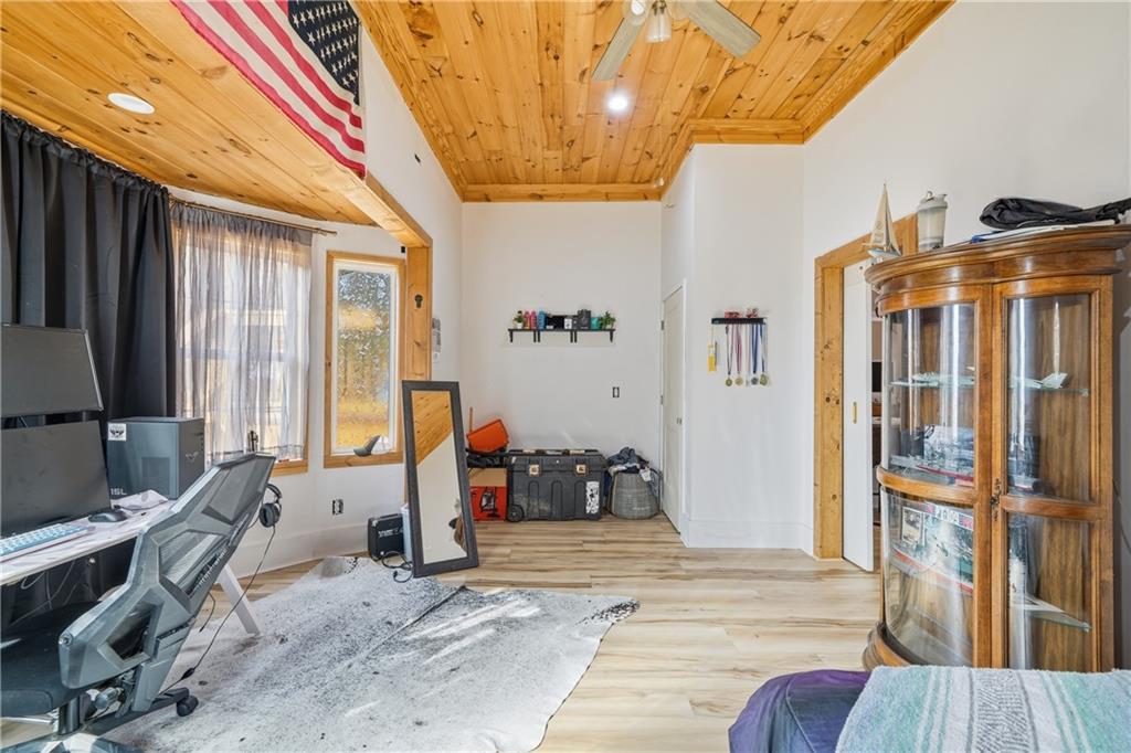 34 Bodie Road Talking Rock, GA 30175 - Photo 41 of 49 a bedroom with furniture and large window