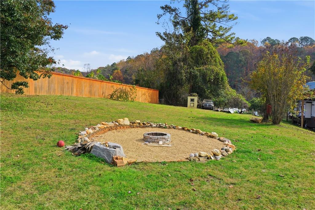 34 Bodie Road Talking Rock, GA 30175 - Photo 7 of 49 a view of a field with an trees
