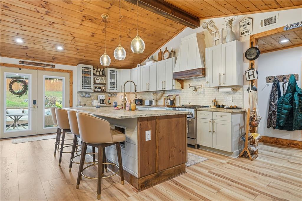 34 Bodie Road Talking Rock, GA 30175 - Photo 9 of 49 a kitchen with a sink cabinets and window