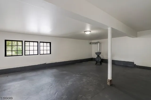 an empty room with windows