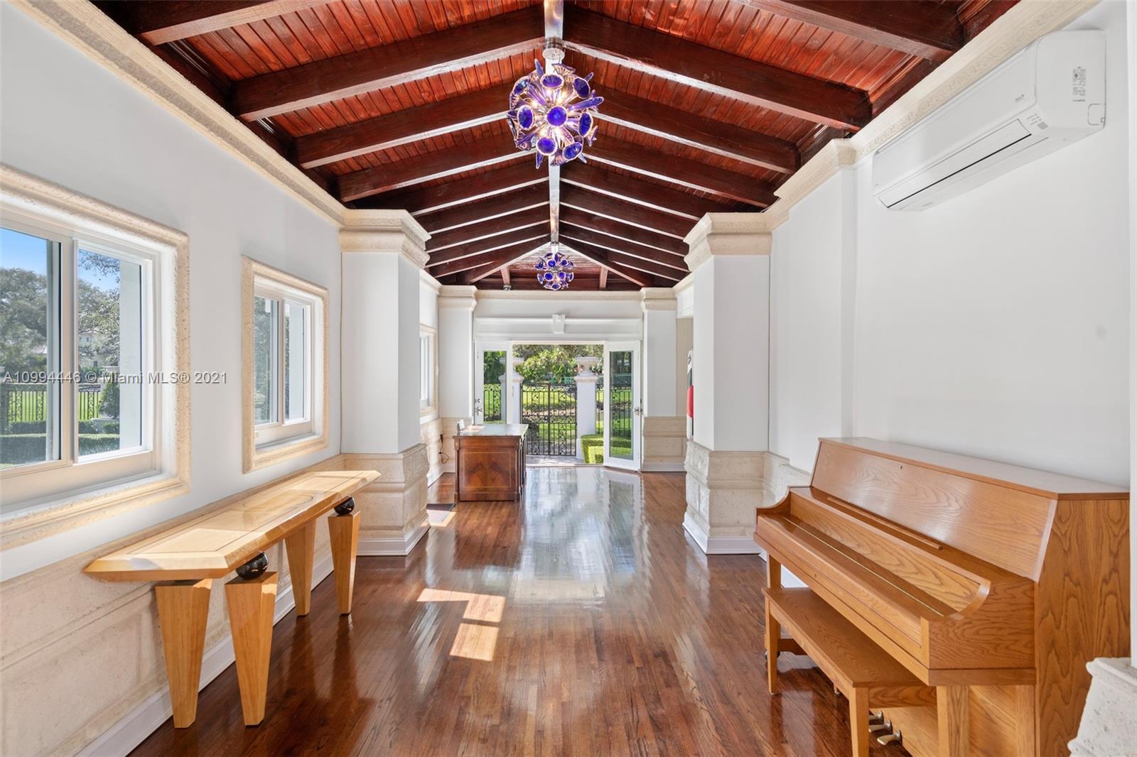 3916 Granada Boulevard Coral Gables, FL 33134 - Photo 36 of 75 a outdoor space with wooden floor and furniture