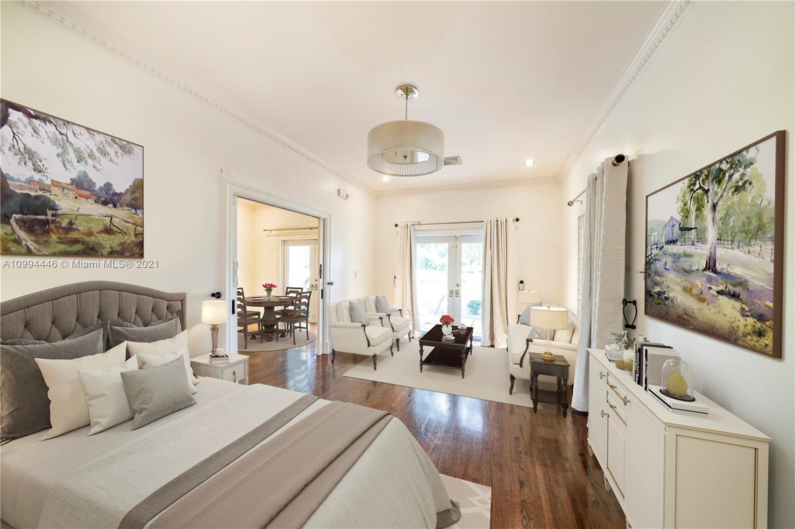 3916 Granada Boulevard Coral Gables, FL 33134 - Photo 38 of 75 a bedroom with furniture and a large window