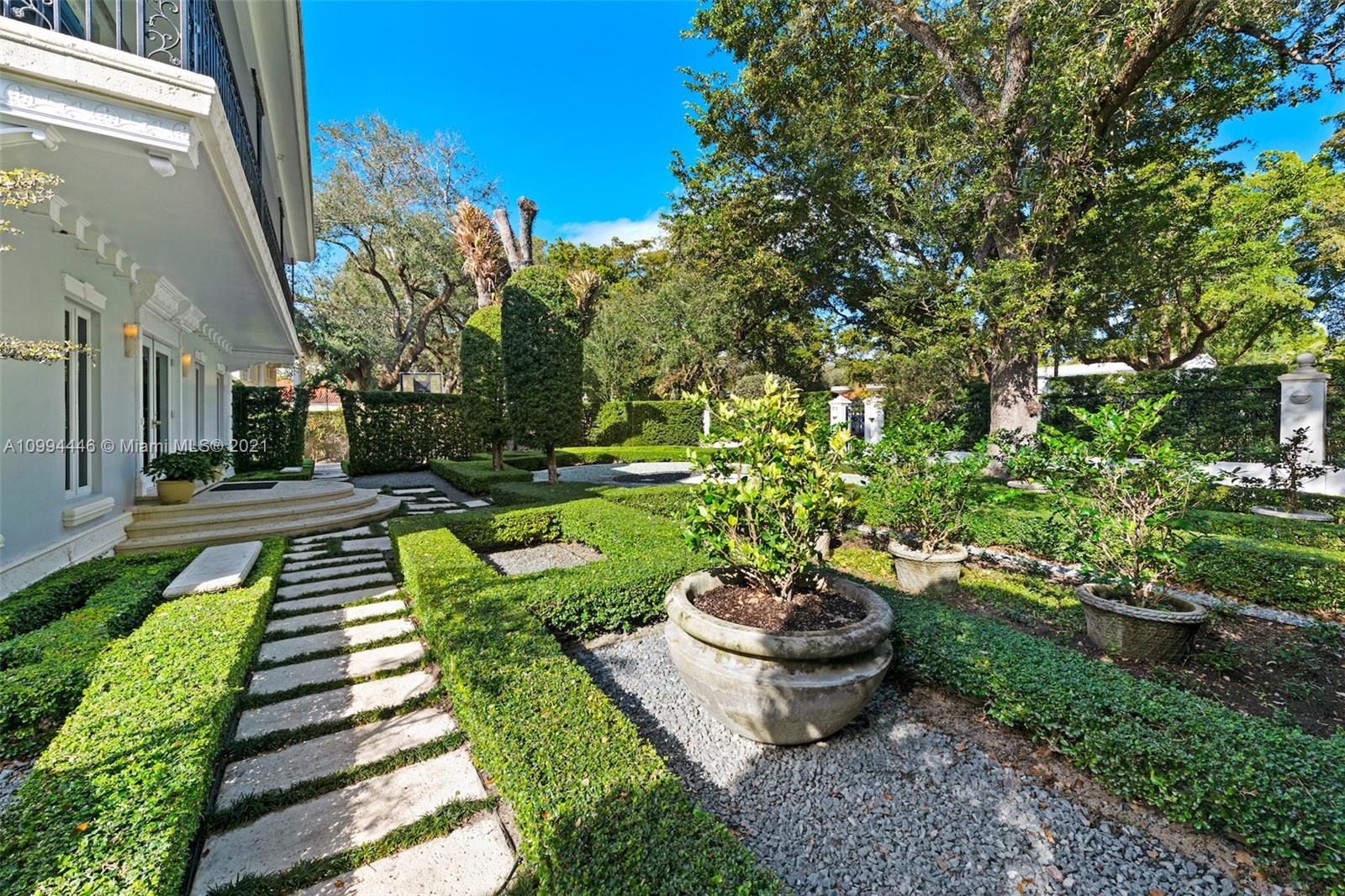 3916 Granada Boulevard Coral Gables, FL 33134 - Photo 62 of 75 a view of a backyard with sitting area