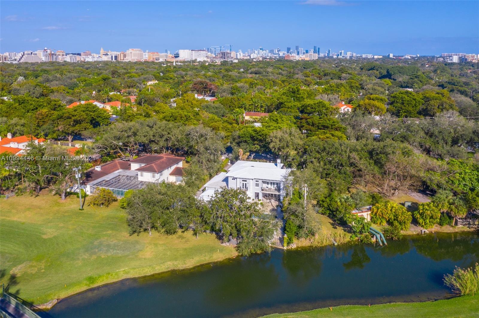 3916 Granada Boulevard Coral Gables, FL 33134 - Photo 71 of 75 a view of a city with lots of residential buildings ocean and mountain view
