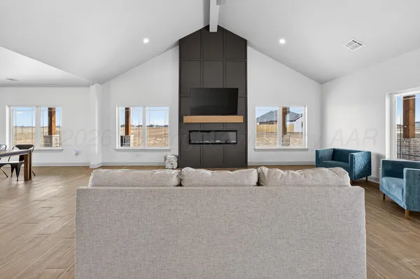 a living room with a couch and a flat screen tv