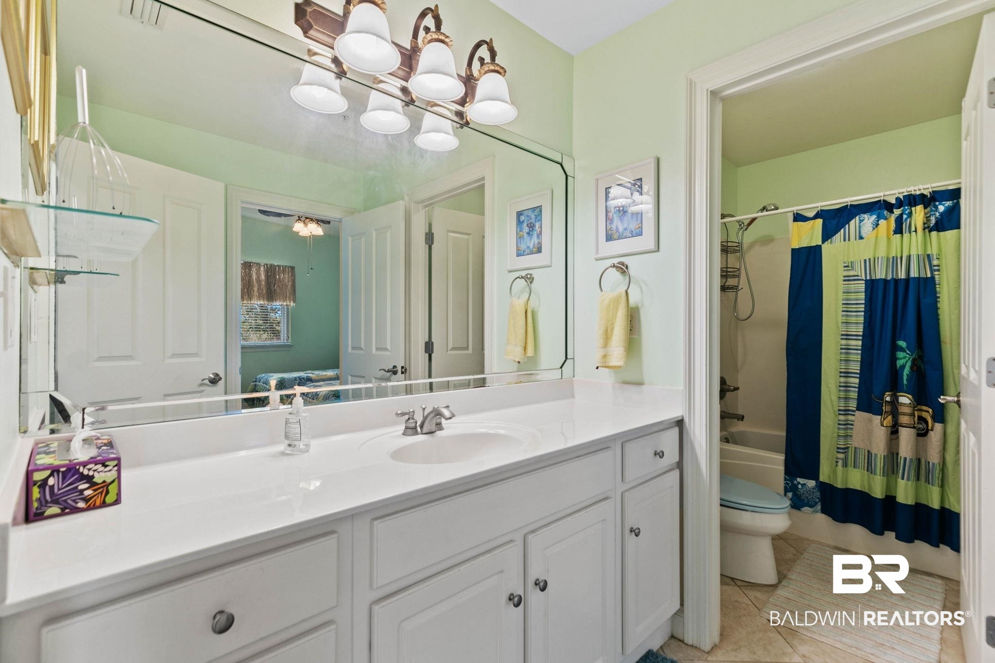 28250 Canal Road, Unit 208 Orange Beach, AL 36561 - Photo 37 of 53 Bathroom with vanity, shower / tub combo, and light tile patterned floors