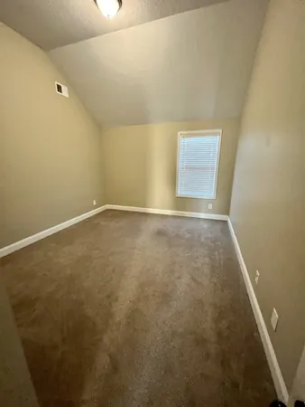 an empty room with a natural light