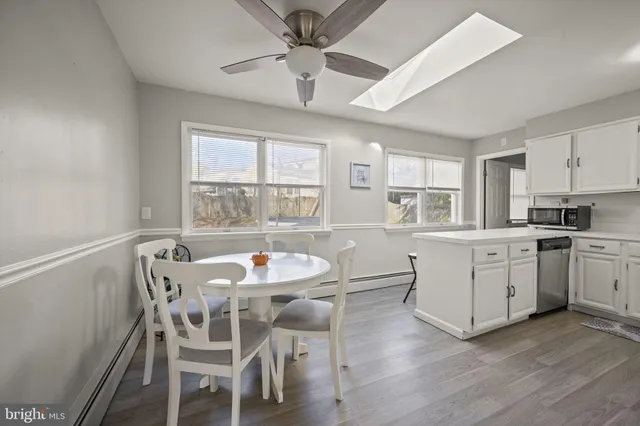 a view of livingroom with furniture wooden floor and window
