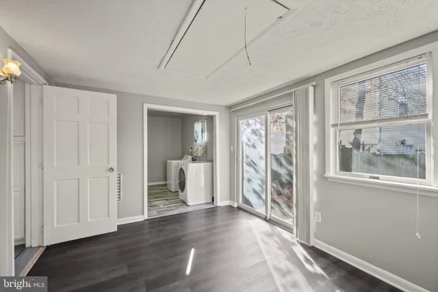 a view of workspace with wooden floor