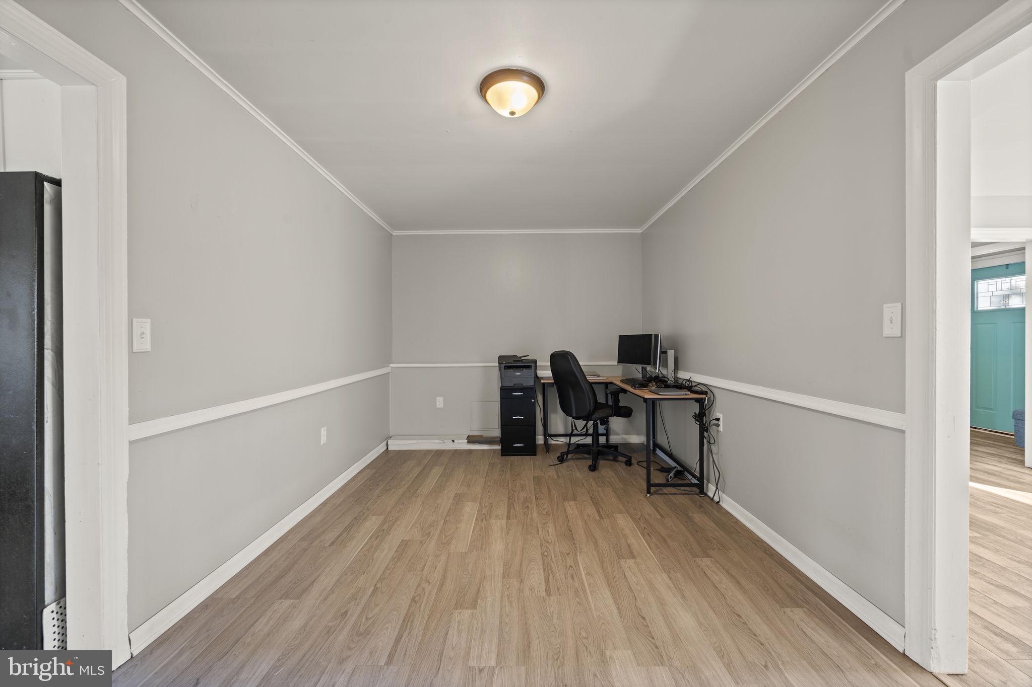 3 Leymar Road Glen Burnie, MD 21060 - Photo 26 of 60 a view of workspace with wooden floor