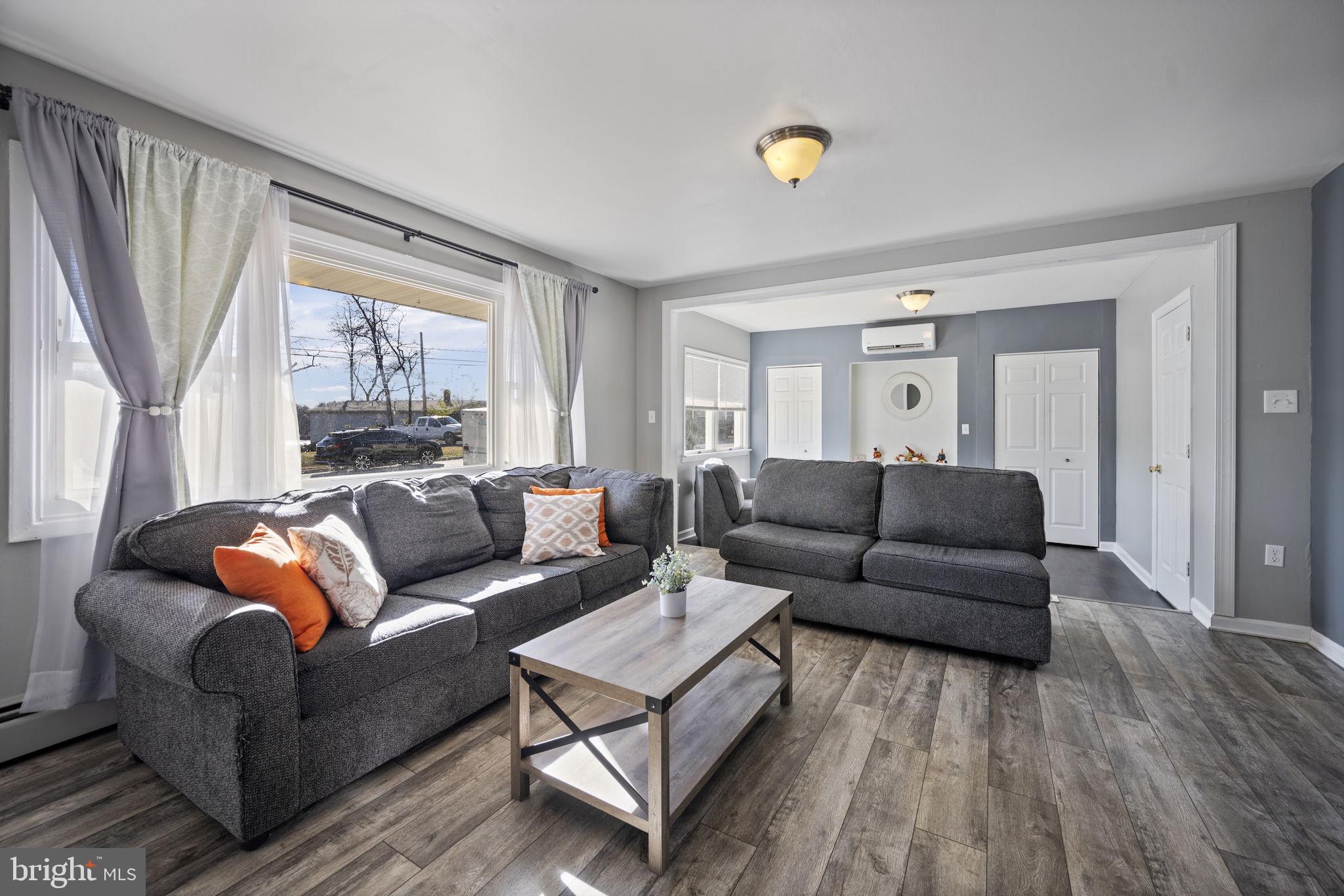 3 Leymar Road Glen Burnie, MD 21060 - Photo 29 of 60 a living room with furniture and a large window