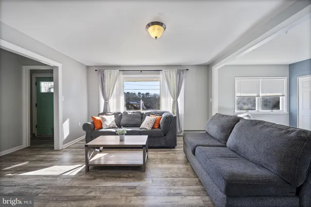 a bedroom with bed and a window