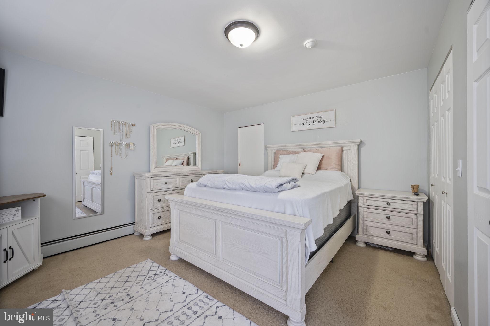 3 Leymar Road Glen Burnie, MD 21060 - Photo 36 of 60 a bedroom with a bed and a cabinets