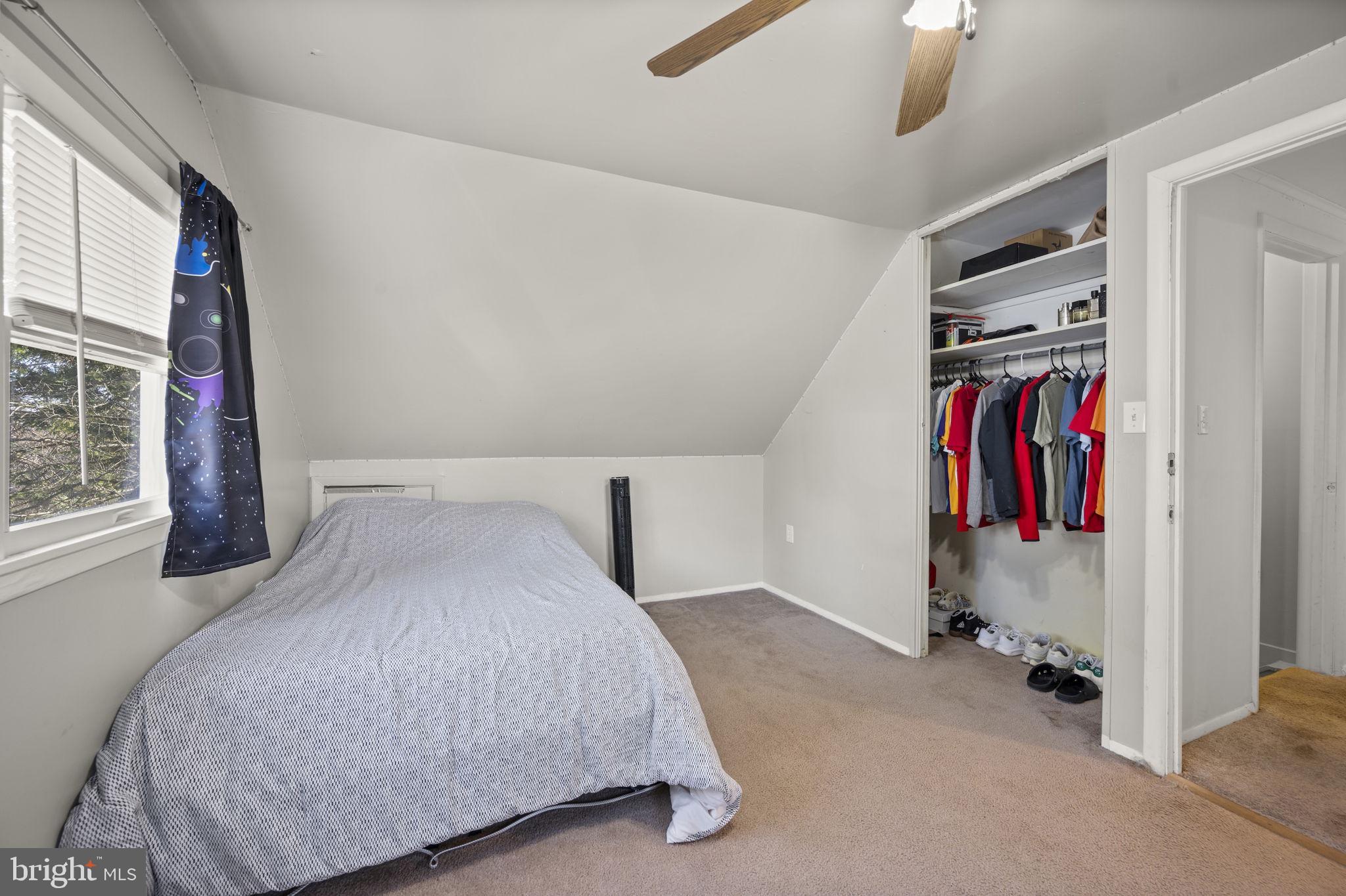 3 Leymar Road Glen Burnie, MD 21060 - Photo 41 of 60 a bedroom with a bed and a walk in closet