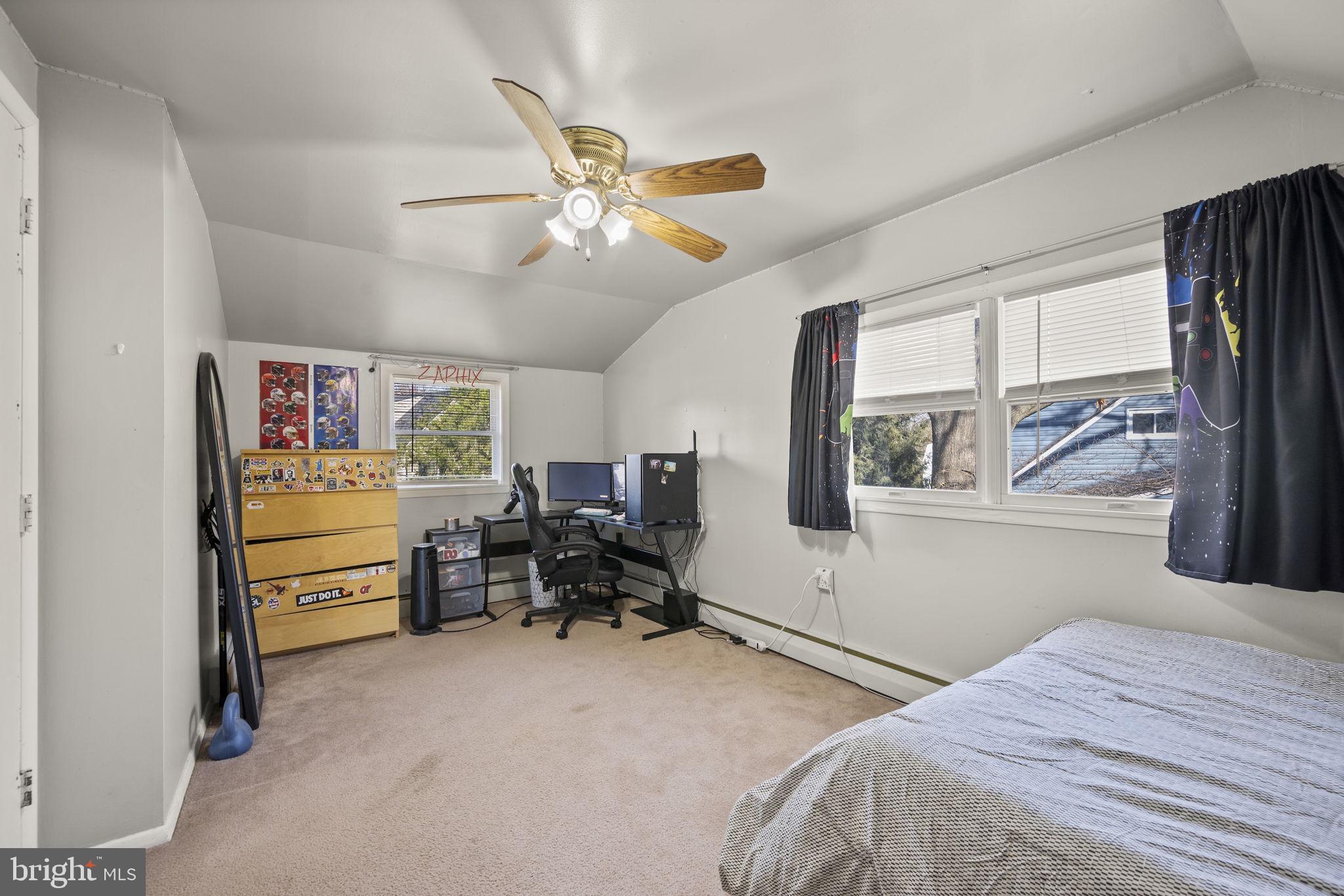 3 Leymar Road Glen Burnie, MD 21060 - Photo 42 of 60 a bedroom with a bed and a large window