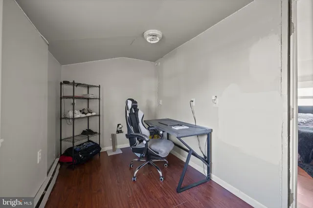 a bedroom with a bed and closet