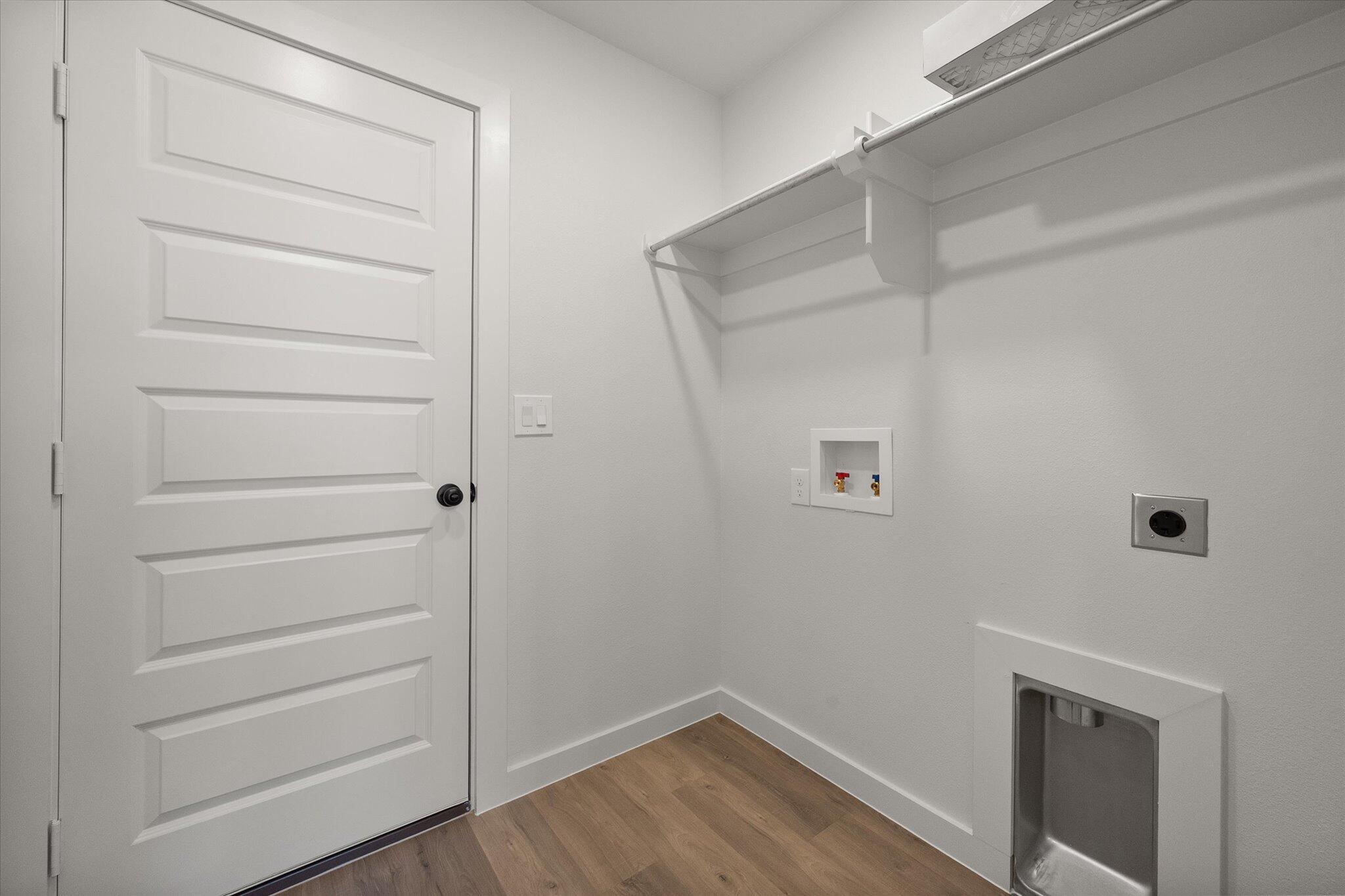 2422 Aberdeen Avenue Wolfforth, TX 79382 - Photo 21 of 23 a view of walk in closet with empty racks