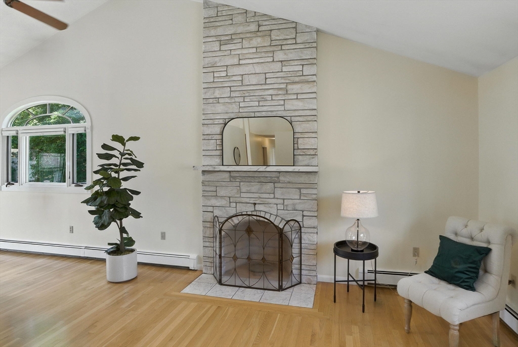 45 Susan Drive Saugus, MA 01906 - Photo 11 of 30 a living room with furniture and a fireplace