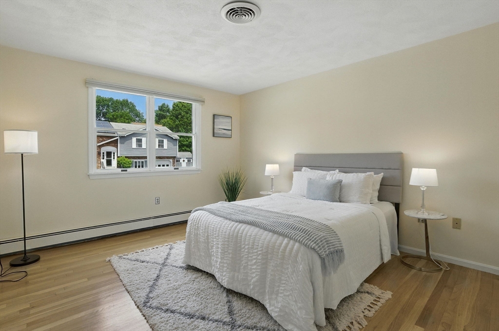 45 Susan Drive Saugus, MA 01906 - Photo 16 of 30 a bedroom with a bed and a window