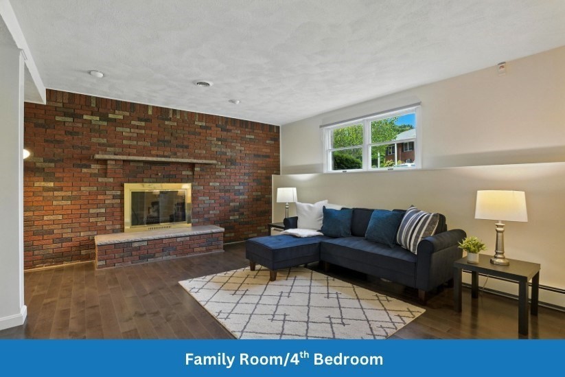 45 Susan Drive Saugus, MA 01906 - Photo 19 of 30 a living room with furniture a rug and a large window