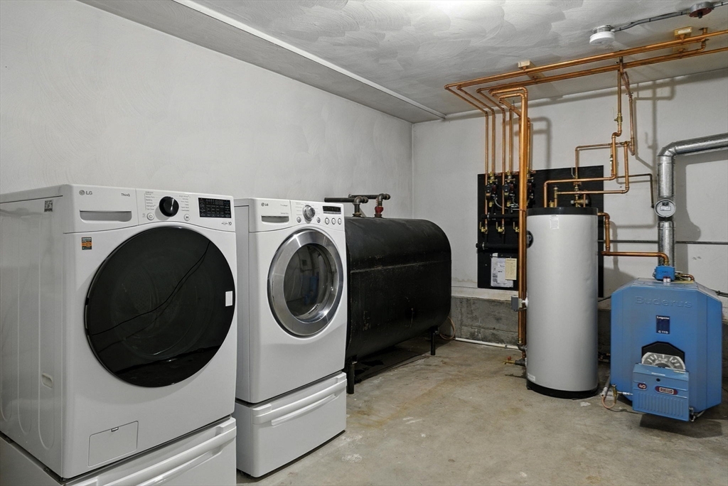 45 Susan Drive Saugus, MA 01906 - Photo 21 of 30 a utility room with dryer and washer