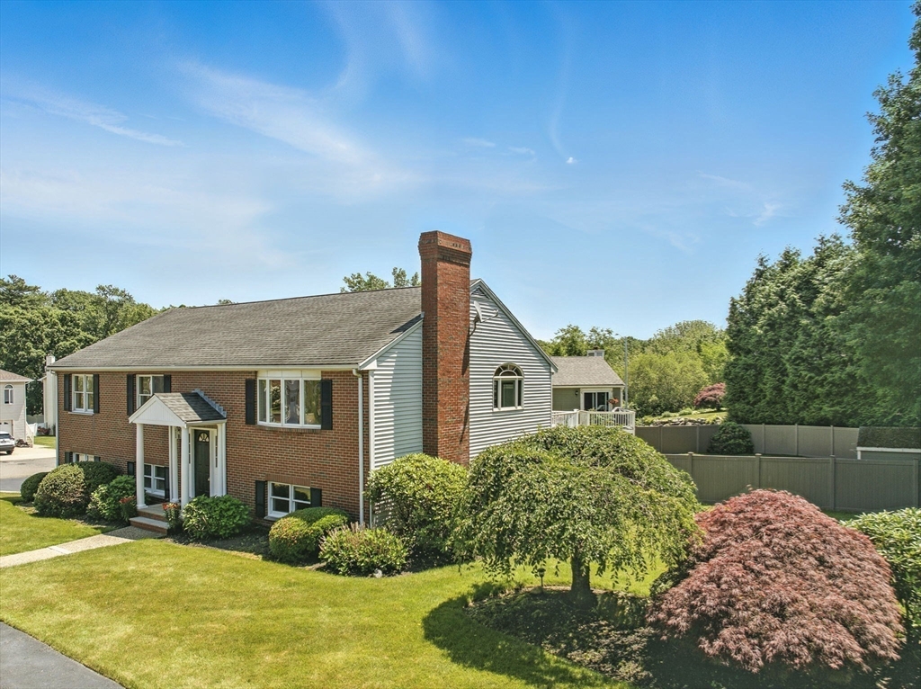 45 Susan Drive Saugus, MA 01906 - Photo 24 of 30 a front view of a house with garden