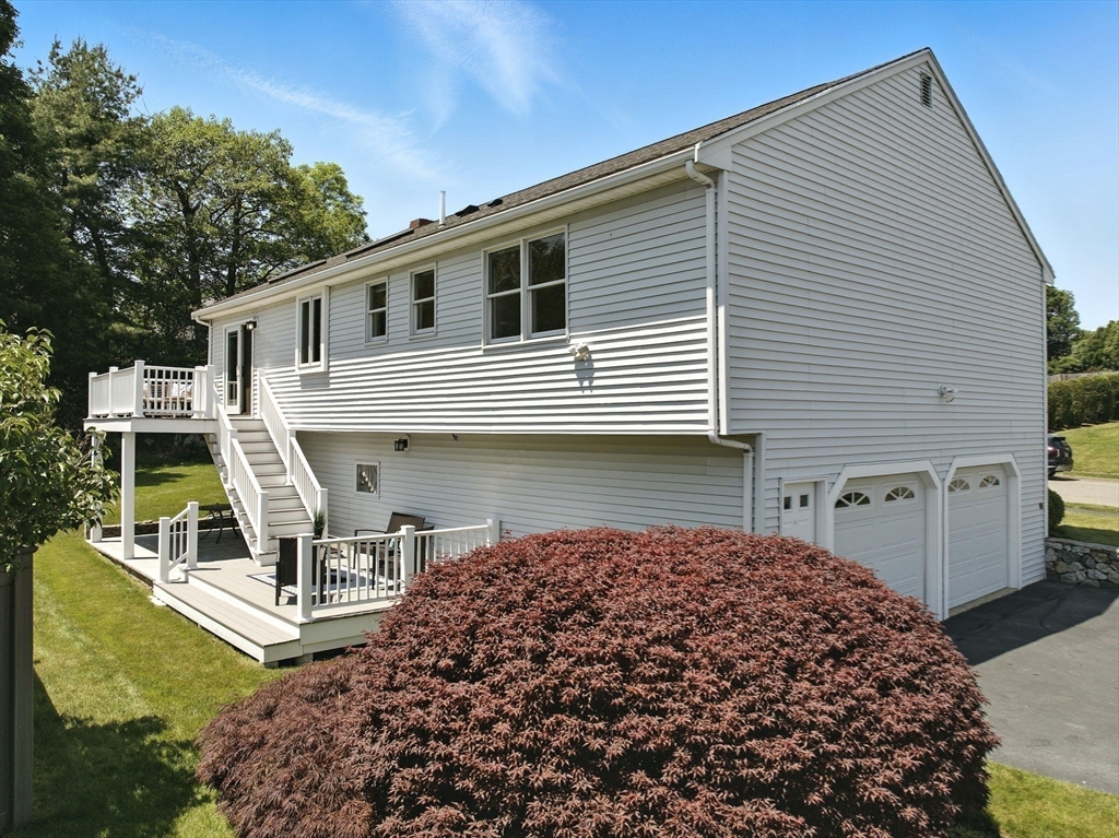 45 Susan Drive Saugus, MA 01906 - Photo 26 of 30 a view of a house with backyard and porch