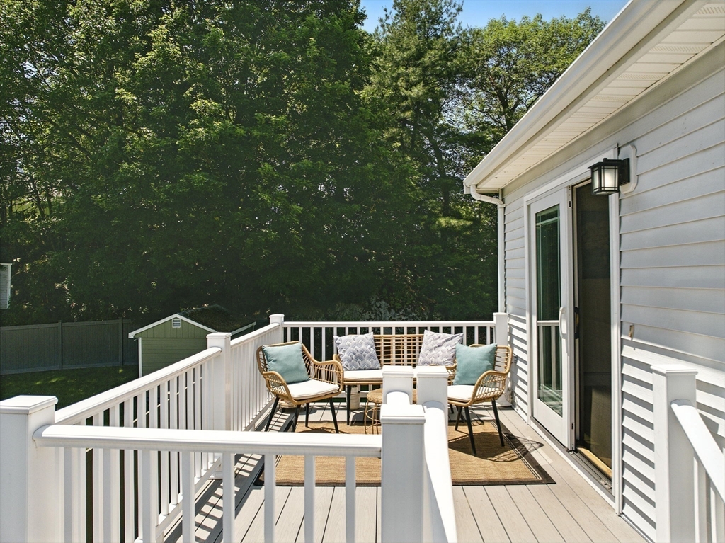 45 Susan Drive Saugus, MA 01906 - Photo 9 of 30 a view of balcony with furniture and hardwood