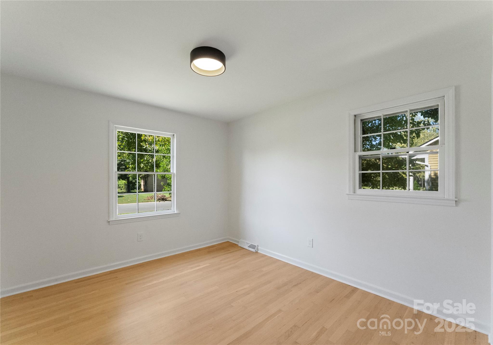 6101 Powder Horn Road Charlotte, NC 28212 - Photo 13 of 27 an empty room with a window