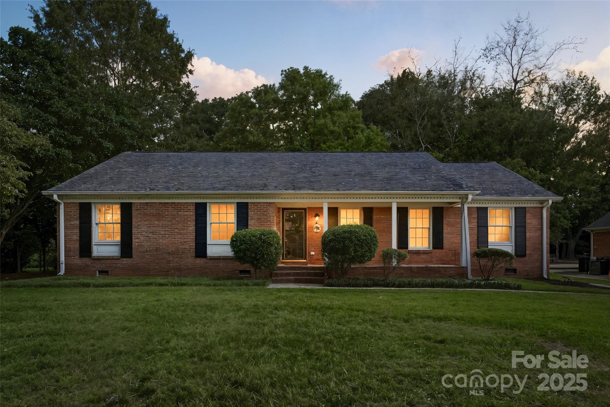 6101 Powder Horn Road Charlotte, NC 28212 - Photo 22 of 27 a front view of house with yard and green space
