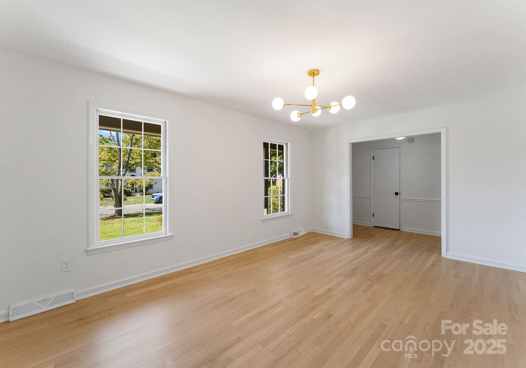 6101 Powder Horn Road Charlotte, NC 28212 - Photo 4 of 27 a view of an empty room with a window