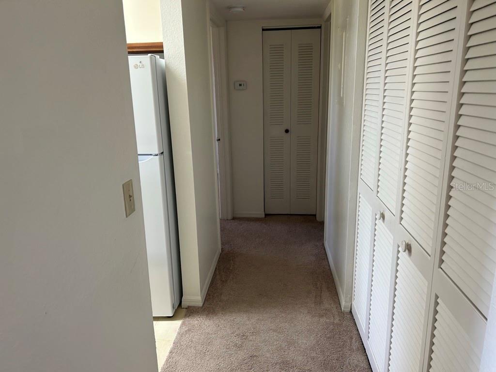 1013 South Hiawassee Road, Unit 3626 Orlando, FL 32835 - Photo 13 of 28 a view of a hallway with a white door