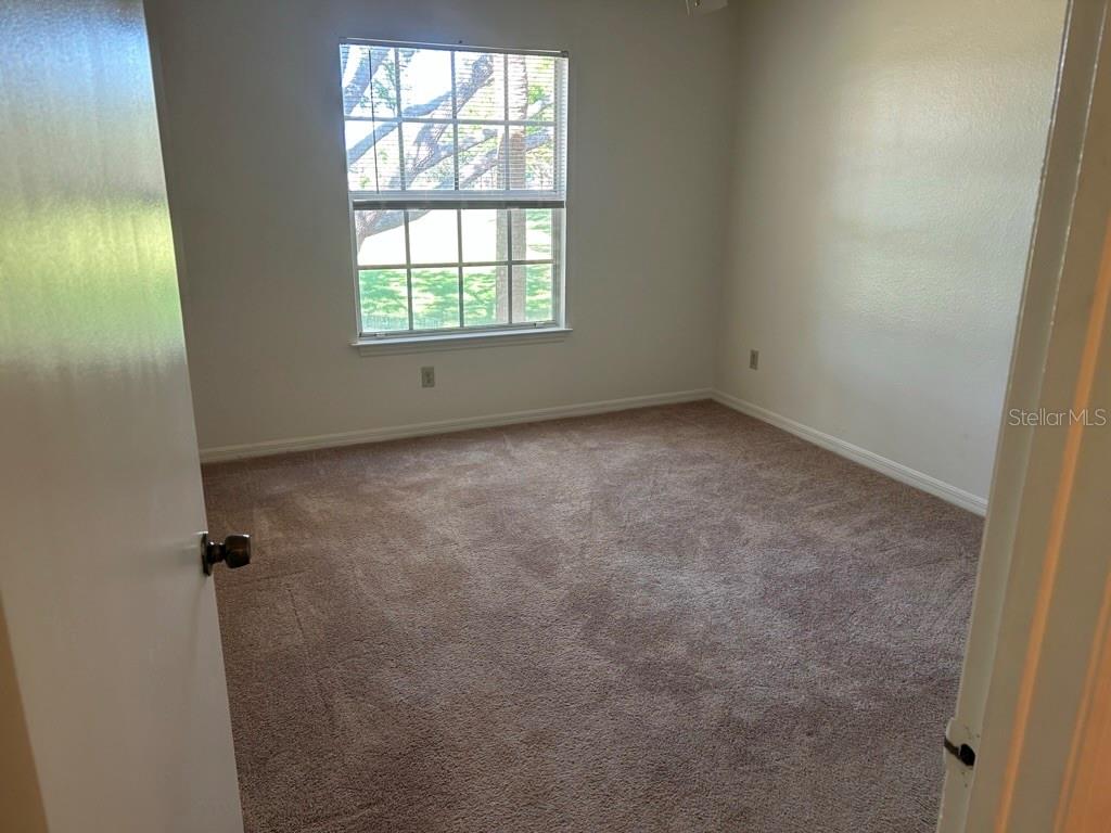 1013 South Hiawassee Road, Unit 3626 Orlando, FL 32835 - Photo 20 of 28 an empty room with a window