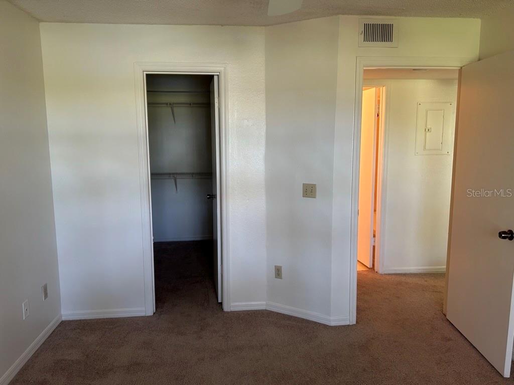 1013 South Hiawassee Road, Unit 3626 Orlando, FL 32835 - Photo 22 of 28 an empty room with closet