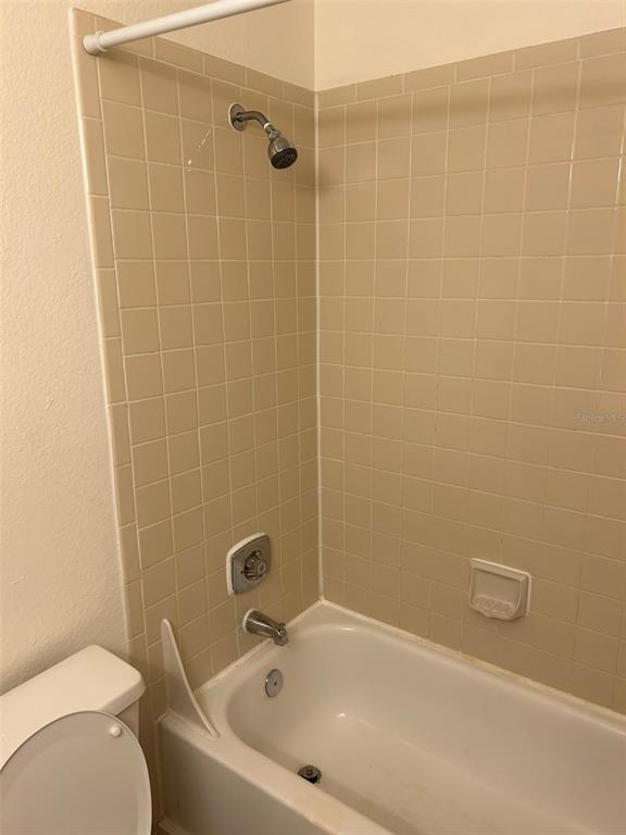 1013 South Hiawassee Road, Unit 3626 Orlando, FL 32835 - Photo 25 of 28 a bathroom with a sink and a toilet