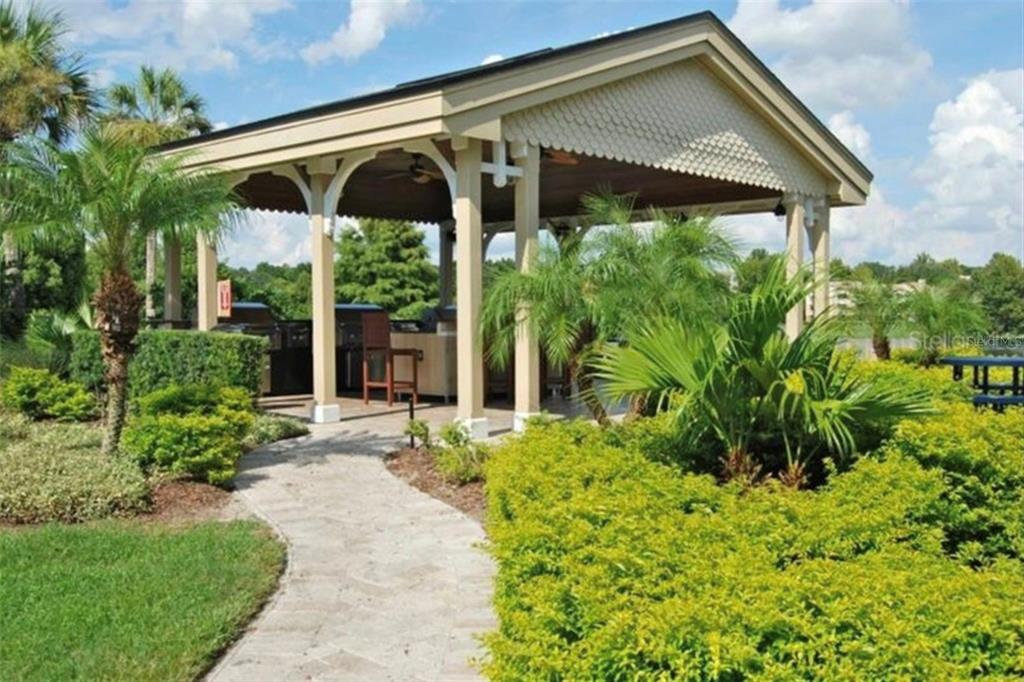 1013 South Hiawassee Road, Unit 3626 Orlando, FL 32835 - Photo 28 of 28 a front view of a house with garden