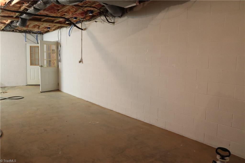 1198 Big Oak Road Germanton, NC 27019 - Photo 31 of 50 Lots of storage room in the basement.
