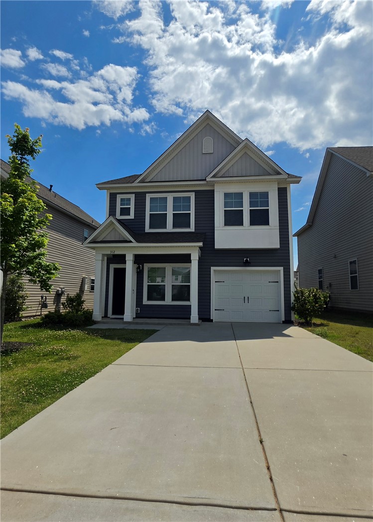 312 Phillips Drive Pendleton, SC 29670 - Photo 1 of 45 A classic two-story home with a pristine concrete driveway and inviting front porch.