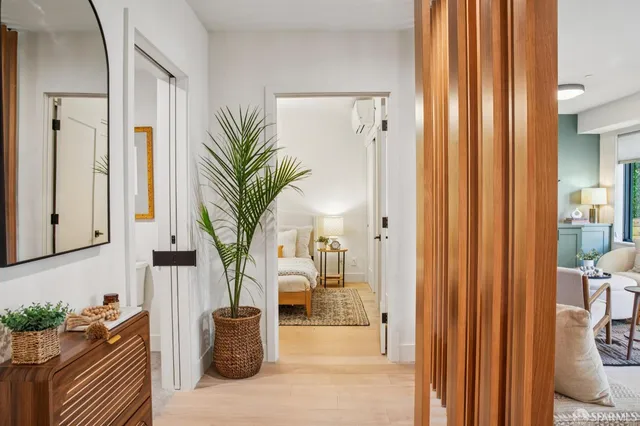 a potted plant sitting in front of a bathroom