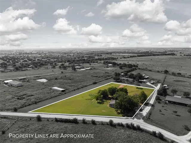 a view of a pool in a yard