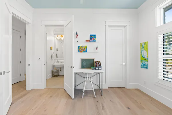 a workspace with furniture and window